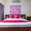 Отель OYO 16075 Aikya Elevens Inn, фото 8