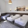 Отель Flatinrome Trastevere Deluxe Rooms, фото 3