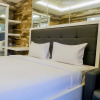 Отель Minimalist Comfy Studio Apartment at Educity Pakuwon, фото 26