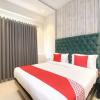 Отель OYO 17084 Hotel Grand Orchid, фото 16