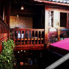 Отель Lijiang Qingyi Inn, фото 1