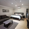 Отель The Place Guest House в Мбабне