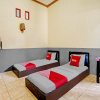 Отель OYO 90405 Penginapan Sasti Kuningan, фото 3