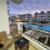 Отель Lovely & Luxury 2 bedroom apartment with Swimming and water aqua park view in Sharm Hills luxury res, фото 1