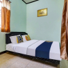 Отель SPOT ON 91159 Kost Putrana Syariah, фото 3