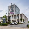 Отель Van der Valk Airporthotel Düsseldorf в Дюссельдорфе