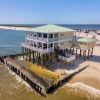 Отель Shamrock Shores Bottom Floor - Large gulf front deck and a private sea wall for fishing! Rent as a 4, фото 12