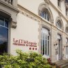 Отель Les Thermes & Le Metropol в Люксёй-ле-Бэн