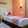 Отель Super OYO Capital O 989 Audah Guesthouse Syariah, фото 3