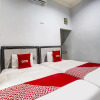 Отель OYO 90771 Mess 19 Syariah, фото 16