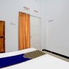 Отель OYO 94021 Guest House Pak Eman, фото 4