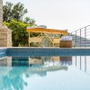 Отель Beachfront Villa Poseidon with Heated Pool, фото 11