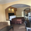 Отель Deluxe Inn & Suites, фото 7