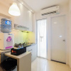 Отель Cozy and Elegant 2BR Bassura Apartment, фото 18