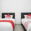 Отель Guest House Dempo Jakabaring by Oyo Rooms, фото 3
