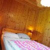 Отель Cosy Chalet With Large Garden and Playground, Located at the Edge of the Forest, фото 2