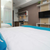 Отель OYO Flagship 214 Appartel Taman Melati Jatinangor, фото 7