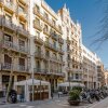 Отель Home Around Exclusive Apartments в Барселоне