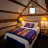 Отель Cottam's Lodge by Alpine Village Suites, фото 5