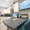 Отель The Stamford Apartment, фото 11