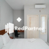 Отель House Acasia Syariah RedPartner, фото 12