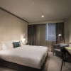 Отель DoubleTree by Hilton Hotel Melbourne - Flinders Street в Мельбурне