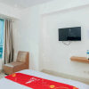 Отель RedLiving Apartemen Grand Kamala Lagoon - Kita Kita Property Tower Emerald, фото 3