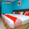 Отель OYO 89517 Little Tanjung Chalet, фото 5