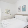 Отель Chic & Modern 2-bed Flat w/ Patio in Pimlico, Central London, фото 7
