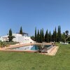 Отель Vilamoura Concept Villa With Pool by Homing в Картейре