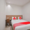 Отель OYO 90306 Mmtc2 Guest House, фото 4
