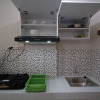 Отель Compact And Tidy Studio At Puncak Dharmahusada Apartment, фото 11