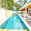 Отель Peaceful Retreat 3 Bedrooms Villa Nelayan Beach, фото 11