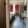 Отель Microtel Inn & Suites by Wyndham Clarksville, фото 15