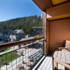 Отель Riverside Condo with the Village and Continental View - Zephyr Mountain Lodge Premium-Rated 2416, фото 5