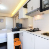 Отель Newly Furnished Studio at Bassura City Apartment, фото 12