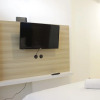 Отель Pleasant Studio Semi Apartment at The Lodge Paskal near BINUS University, фото 2