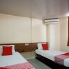Отель OYO 93066 D'niel Homestay Syariah, фото 6