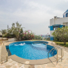 Отель OYO 26700 Home Greek Style 3BHK Bambolim, фото 4