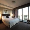 Отель Docklands Prestige Apartments в Мельбурне