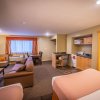 Отель Alpine Inn & Suites, фото 5