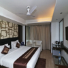 Отель OYO 12860 Hotel Red Leaf, фото 10
