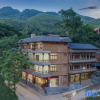 Отель Guangnan ba mei three meals four season home stay, фото 1