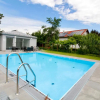 Отель Modern Balcony Apartment with Pool close to Lake in 