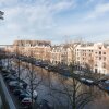 Отель 17th Century Canal Apartment with Roof Terrace в Амстердаме