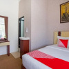 Отель OYO 3225 Alinia Guest House Syariah, фото 10