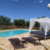 Отель Antico trullo ristrutturato con piscina e giardino, фото 8
