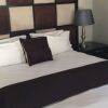 Отель Dube Executive Suites, фото 5