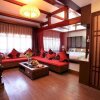 Отель Zhenmei Holiday Inn - Lijiang, фото 5