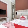 Отель OYO 747 Cipunegara Residence, фото 6
